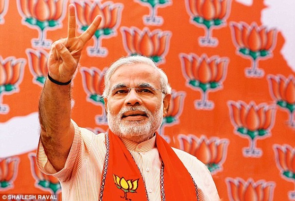 Photo Credit http://www.yellowhorizon.com/the-modi-fied-indian-democracy-from-tea-selling-to-country-sailing-long-way-to-go/